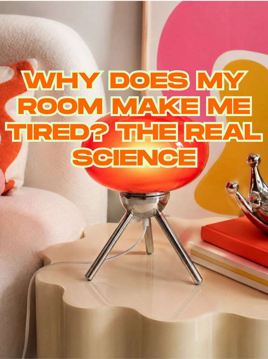 Red tripod mushroom lamp glowing in a colorful living room corner beside a boucle chair — cover for Why Does My Room Make Me Tired