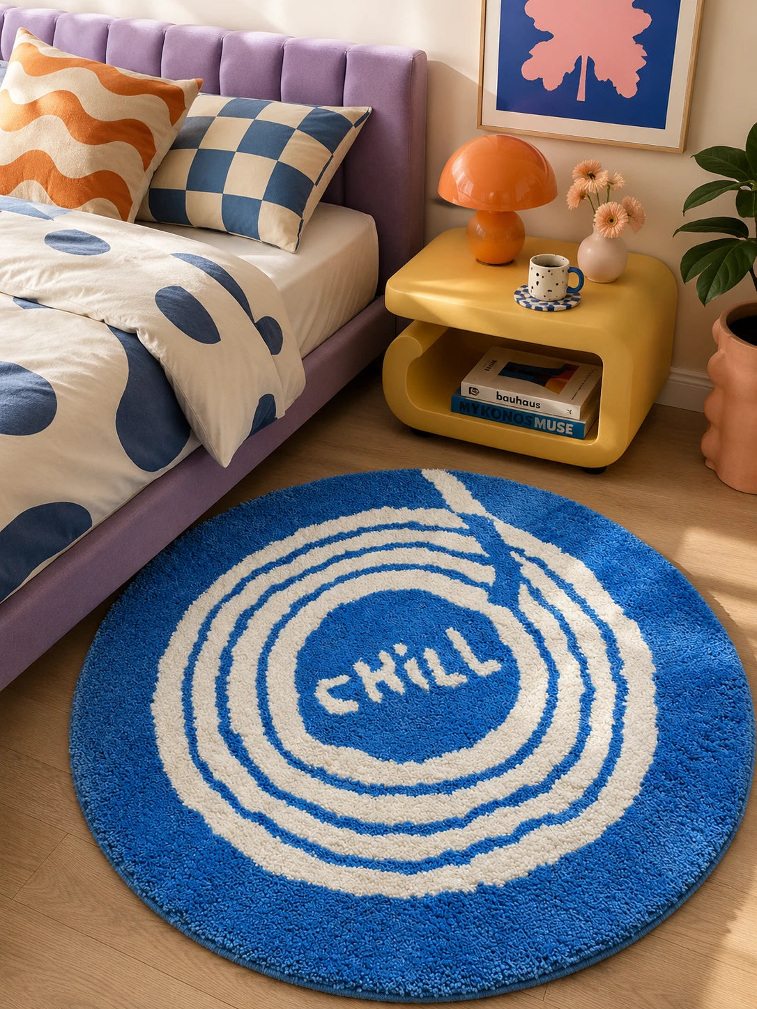 round chill record rug beside a purple bed frame and yellow nightstand with an orange mushroom lamp