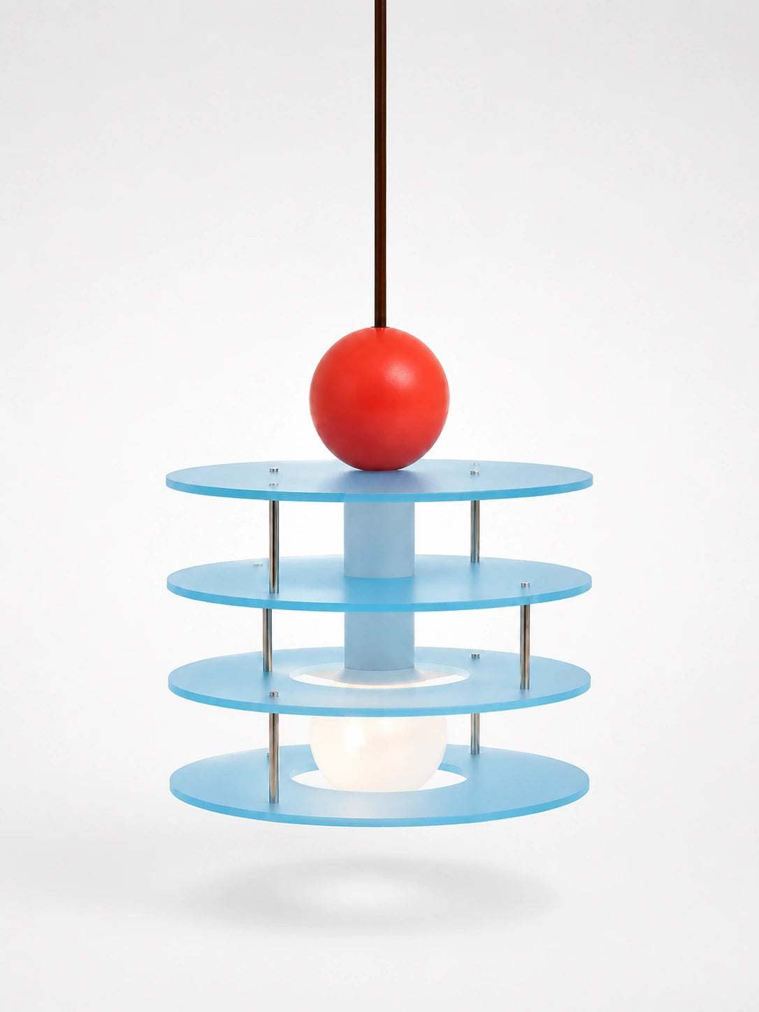 layered pendant light with four frosted blue acrylic discs, white center column, and glossy red ball finial