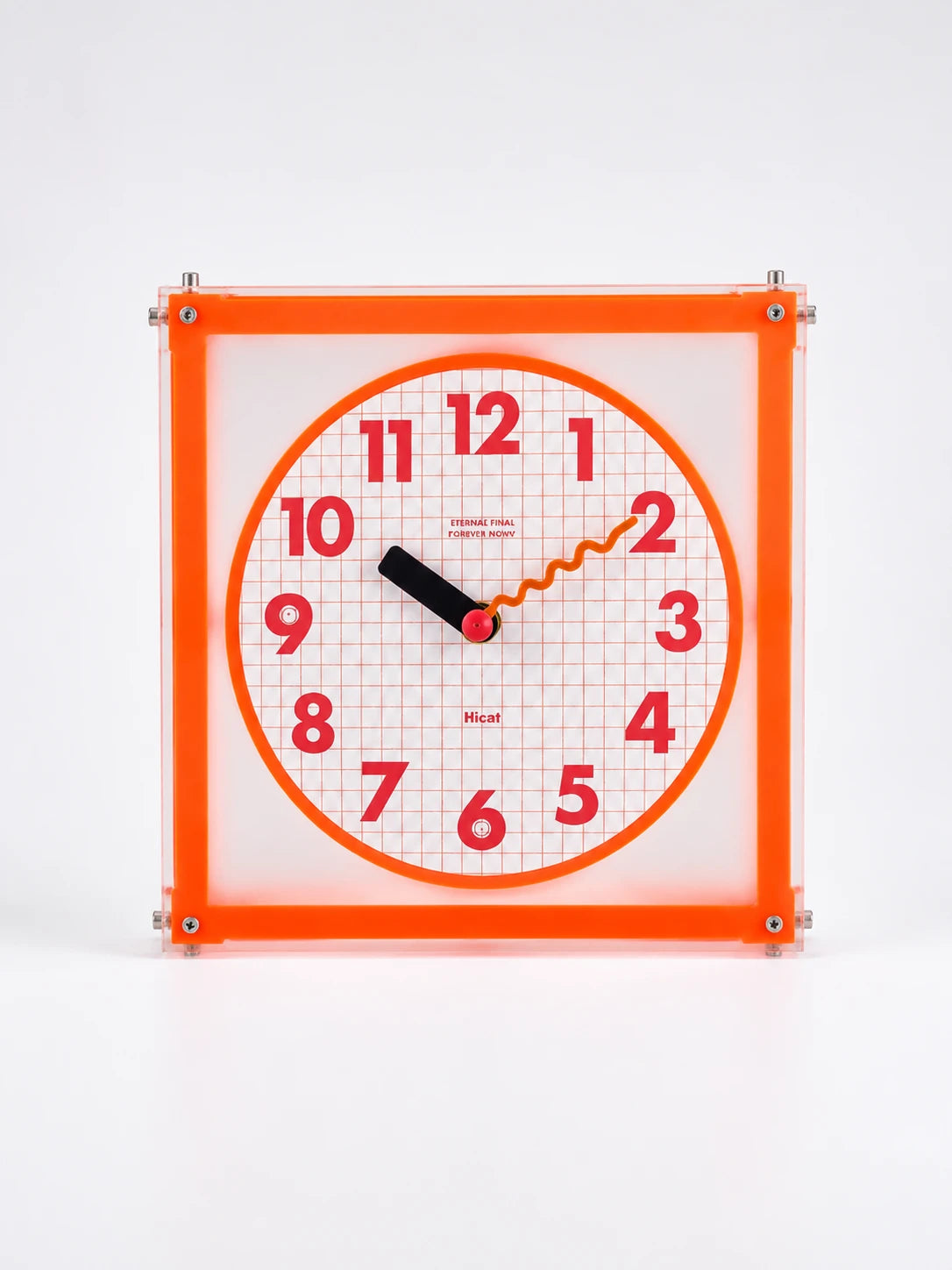square corner clock with fluorescent orange acrylic frame, graph paper grid dial, and red numerals