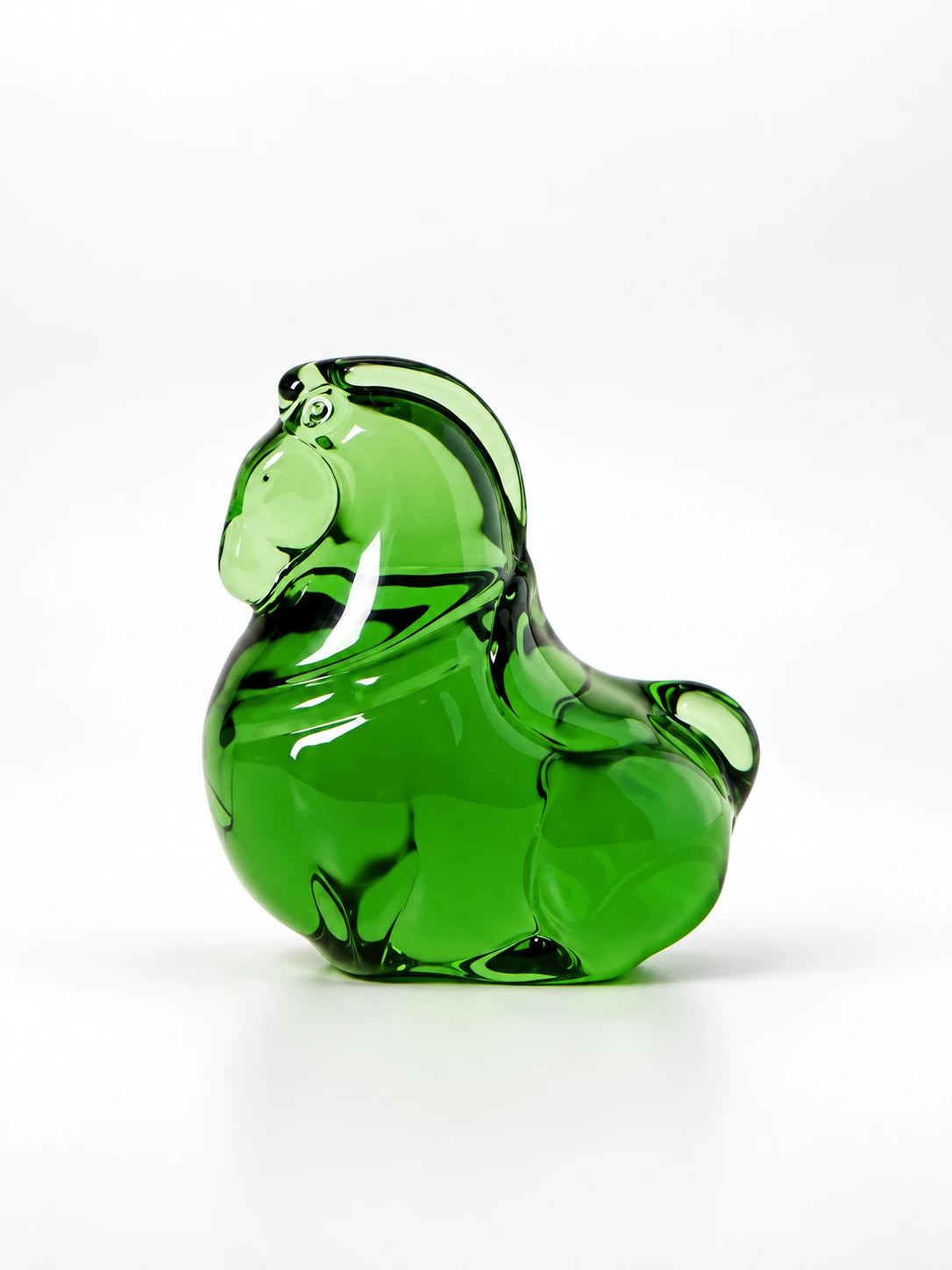 Green glazed glass pony figurine, studio shot