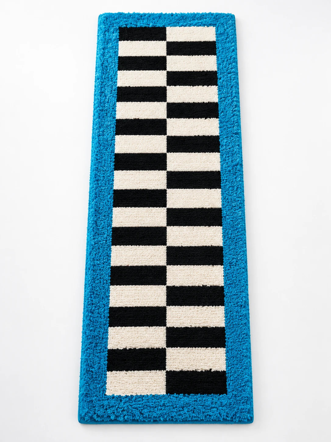 Blue border checkerboard runner rug with two columns of offset black and cream bars, flat studio shot