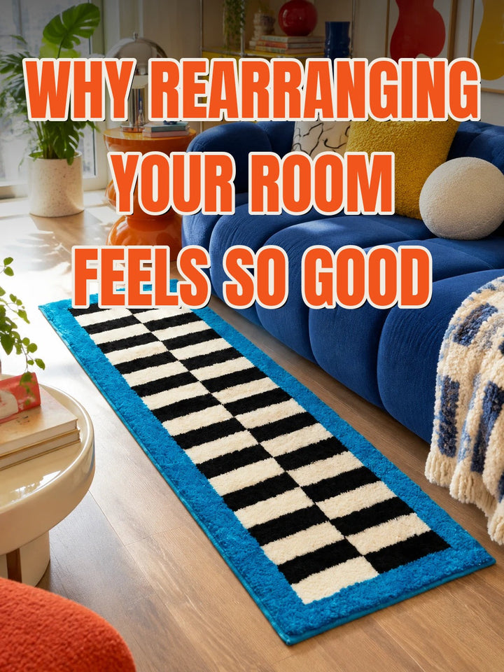 Cobalt channel sofa with a yellow pillow beside a blue-bordered checkerboard runner rug on a wood floor, cover for The Mood Files post on rearranging your room