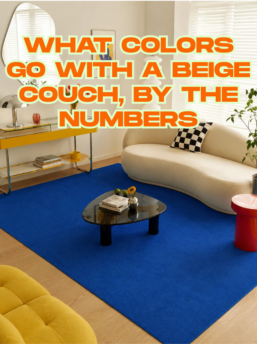 Cream curved sofa on a cobalt blue rug with a yellow console and red side table — accent colors for a neutral sofa