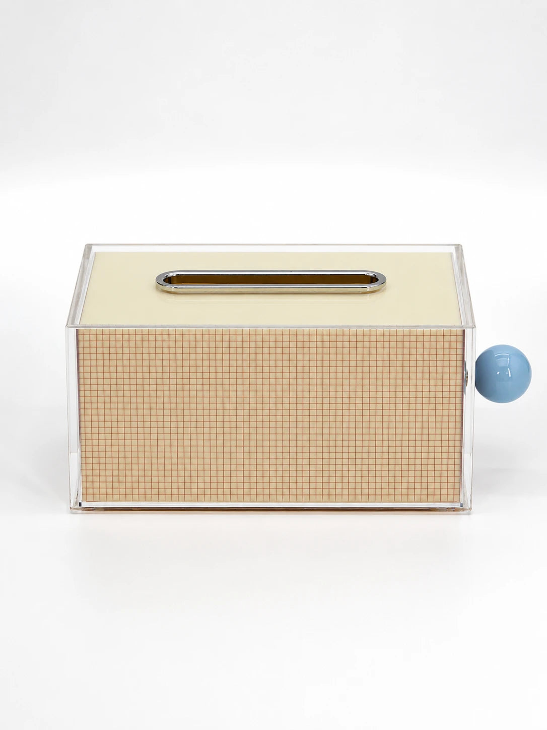 cream acrylic tissue box with tan graph-paper grid, chrome slot and light blue ball accent