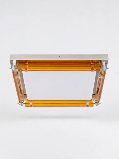 square flush mount ceiling light with stepped amber acrylic slats, chrome rods, and white opal center diffuser