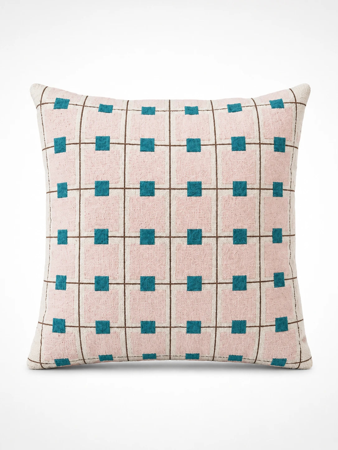 blush-pink grid throw pillow with thin brown lines and teal squares at each intersection