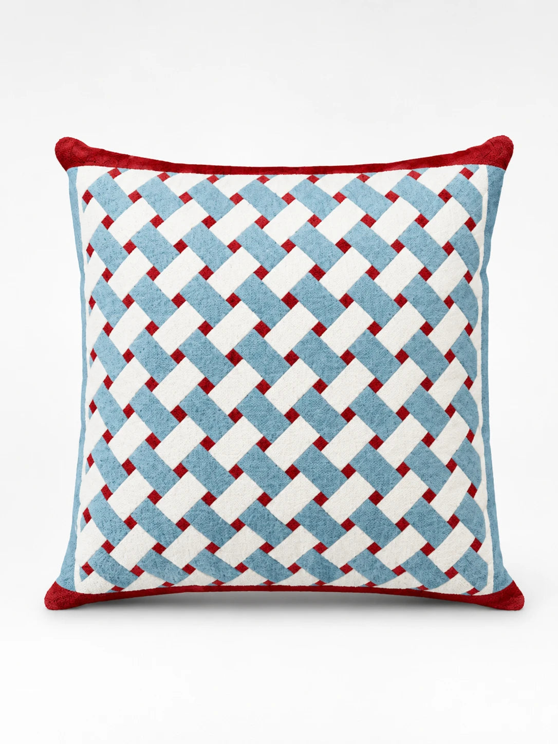 square throw pillow with a blue and white diagonal basketweave pattern, red dots at the crossings and a red border
