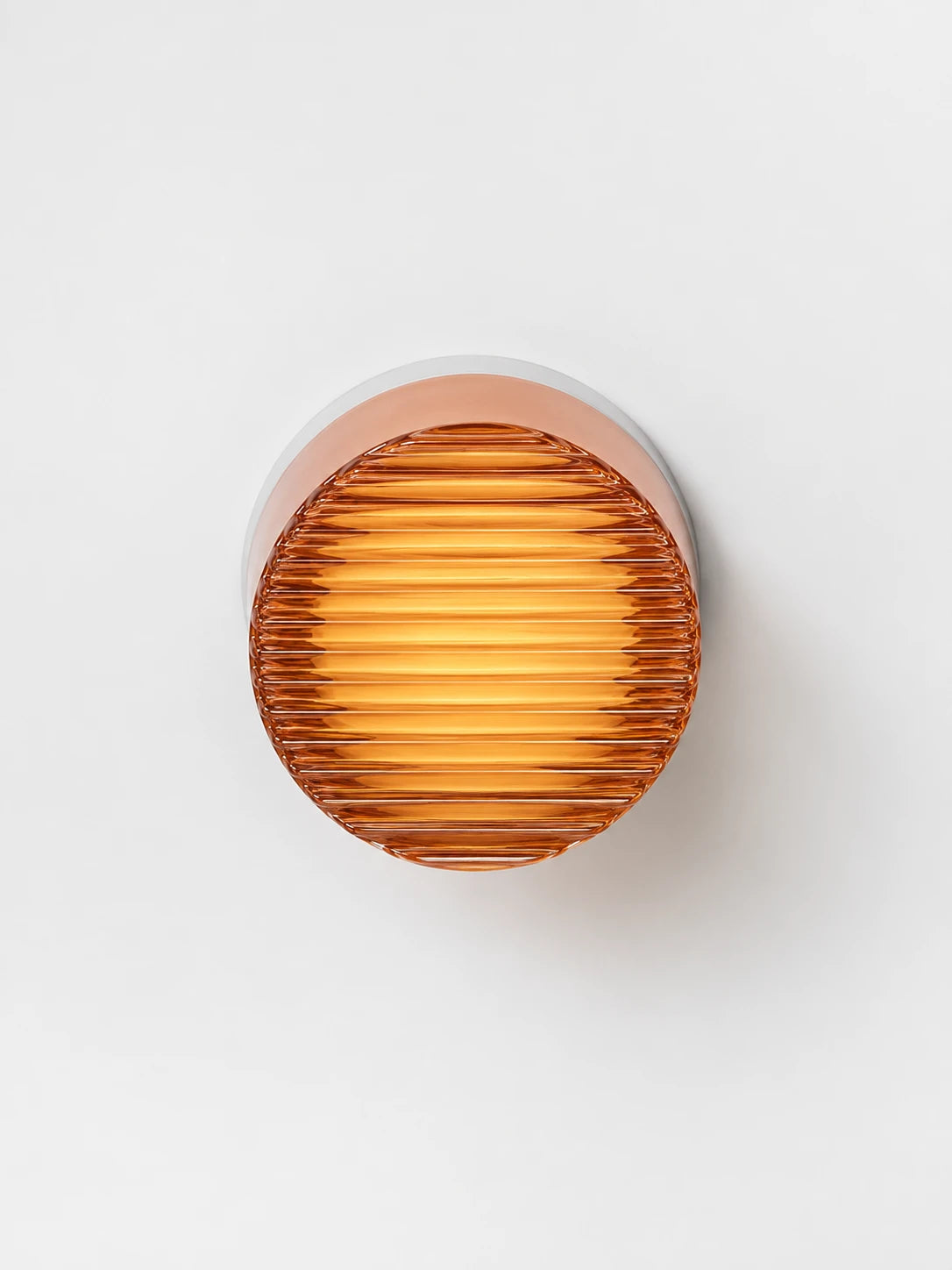 close-up of the amber acrylic wall lamp