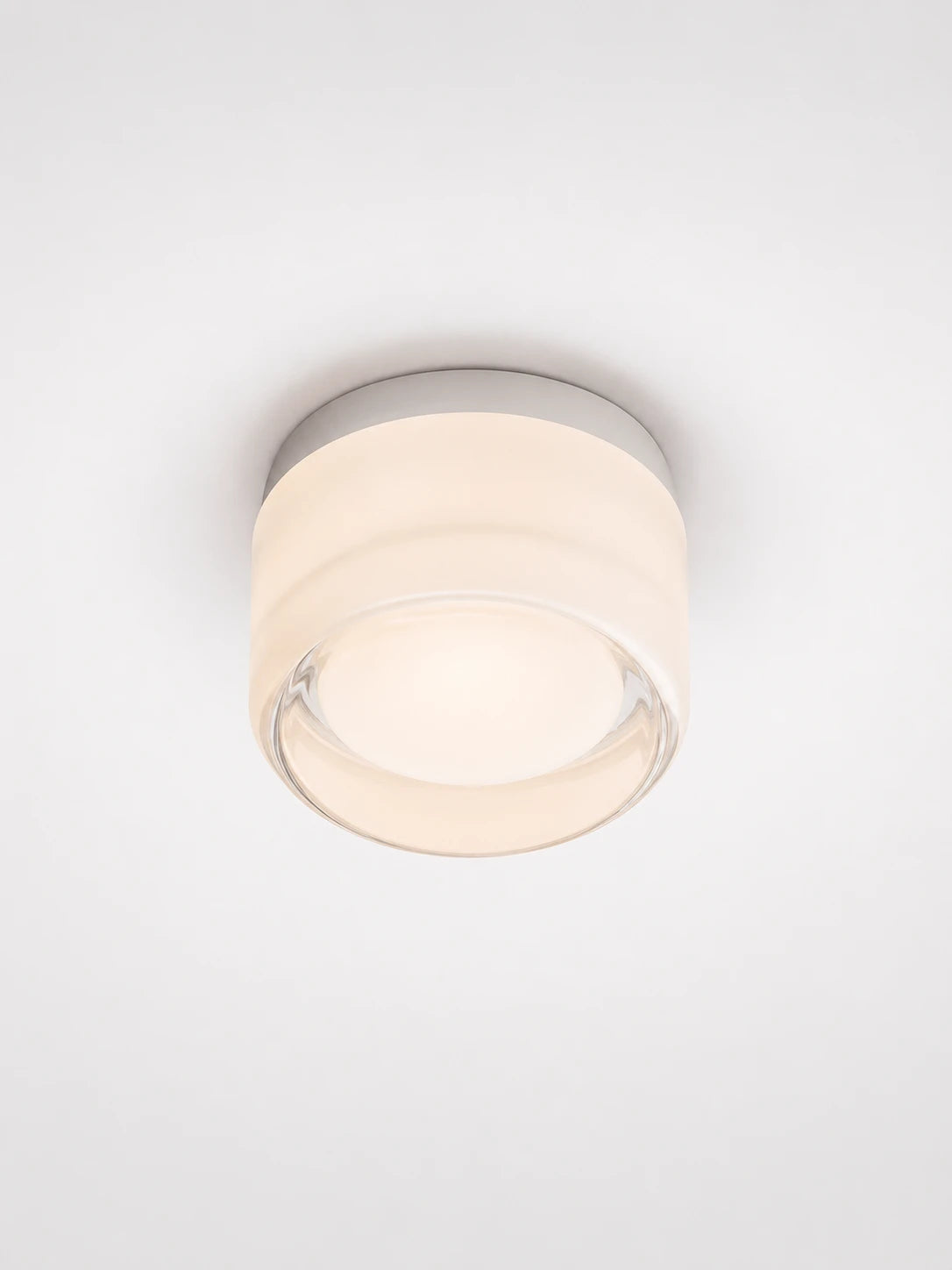 warm amber wall lamp mounted flush on a wall