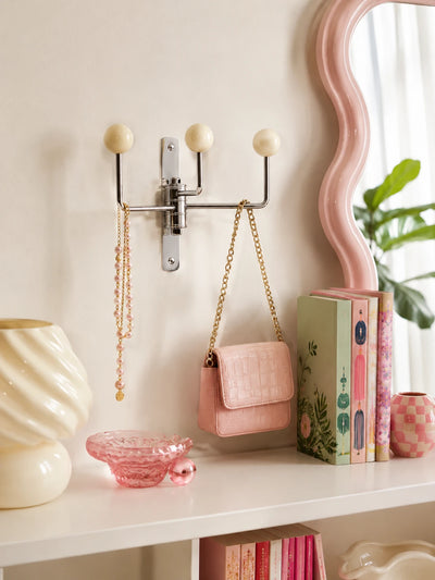 Mid-Century Modern Swivel Hook Rack: Functional Wall Art