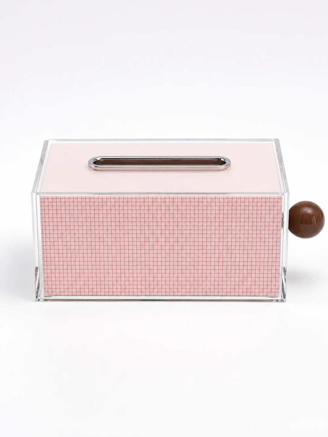 pink acrylic tissue box with red grid print, chrome oval slot and glossy brown ball on the side