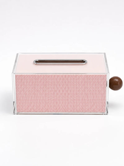 pink acrylic tissue box with red grid print, chrome oval slot and glossy brown ball on the side