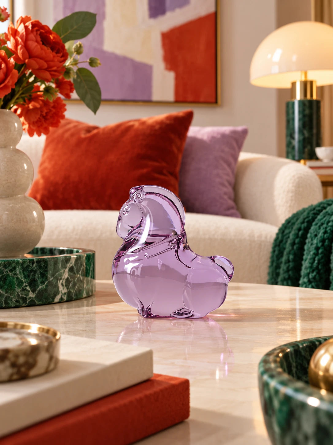Small glazed pony figurine displayed with colorful home decor