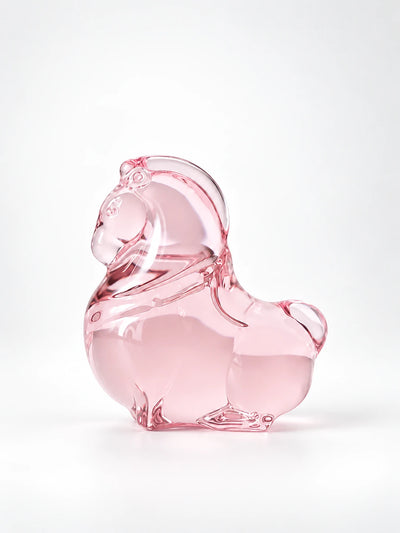 Sakura pink glazed glass pony figurine, studio shot