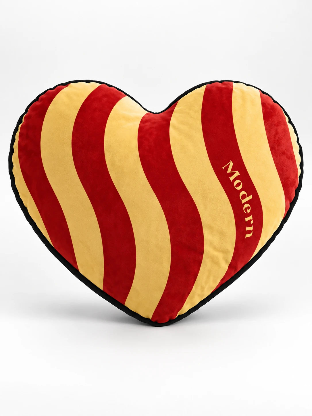 
Red and cream wavy striped heart throw pillow with black piping, studio shot