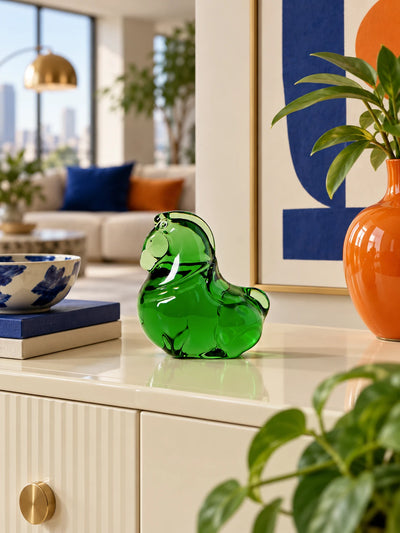 Translucent glazed pony catching the light on a display surface
