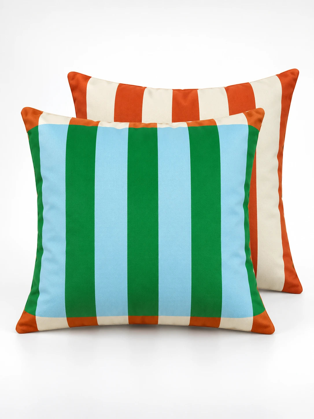 Cabana stripe throw pillow in kelly green and sky blue with orange trim, paired studio shot