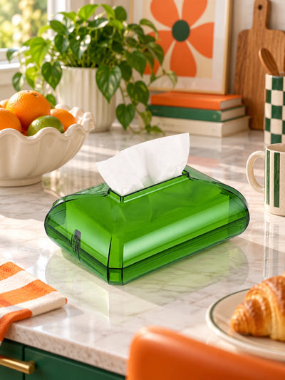 Green acrylic tissue box on a sunny kitchen counter with a fruit bowl