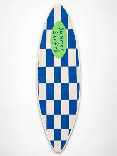 Surfboard-shaped rug with blue and cream checkerboard and green Summer Surfing badge, flat view