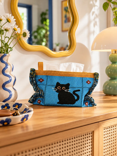 blue cat knitted tissue pouch on an entry console