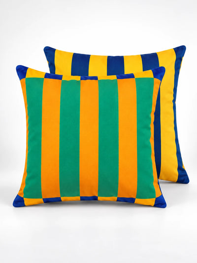 Striped throw pillow in teal green and orange with blue and yellow trim, studio pair