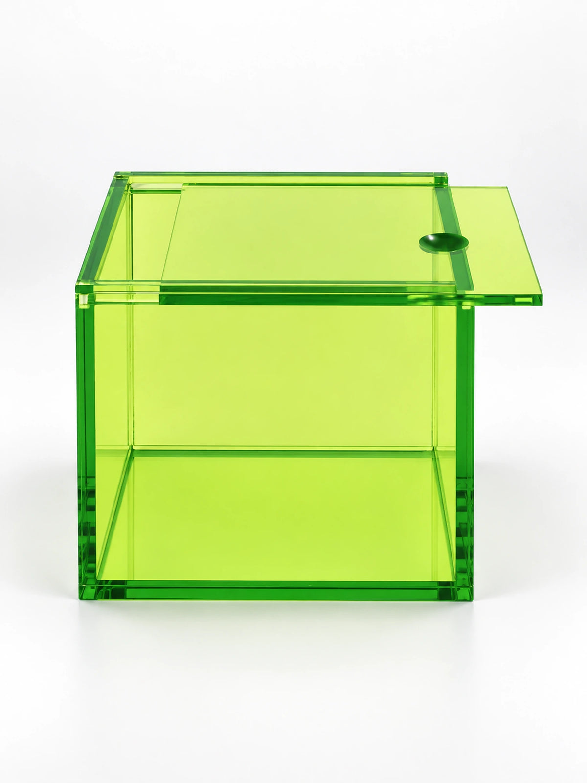 
green tinted acrylic storage box with sliding lid and round knob, studio view