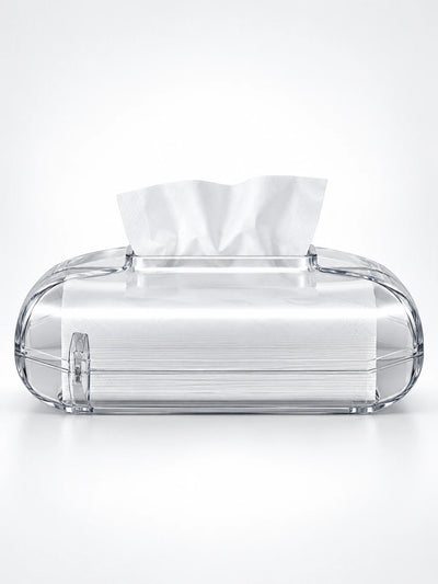Crystal clear acrylic tissue box showing white tissues inside, studio shot